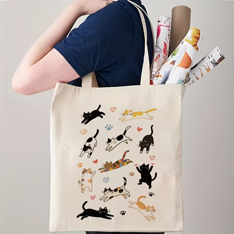 Canvas Tote Designer - กระเป๋าโท้ทลายแมวน่ารักสำหรับผู้หญิง - กระเป๋าถือสีเบจอ่อนพร้อมลายพิมพ์แมวและอุ้งเท้าสีดำ, กระเป๋าเดินทางอเนกประสงค์สำหรับใส่ของชำ, ของขวัญ