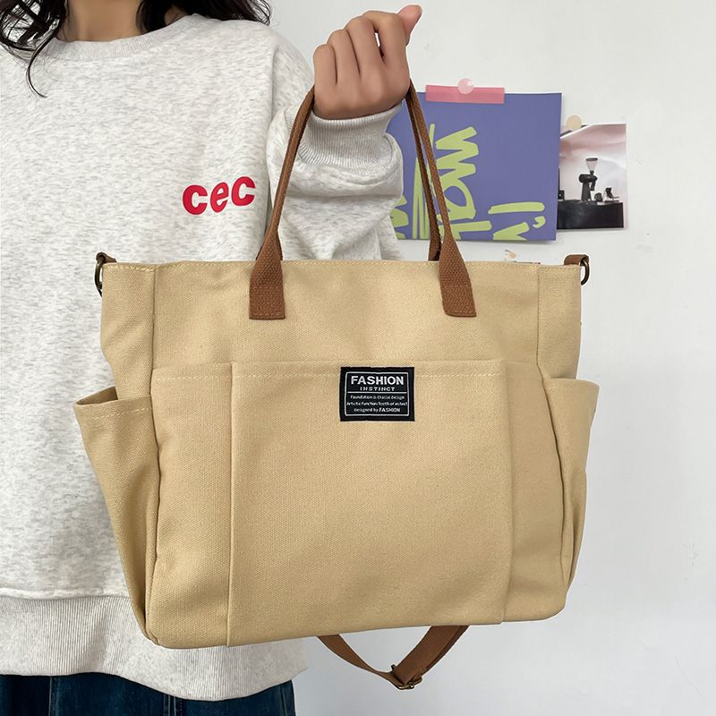 กระเป๋าผ้าแคนวาสใบใหญ่สำหรับผู - Canvas Tote Designer บทวิจารณ์และราคา