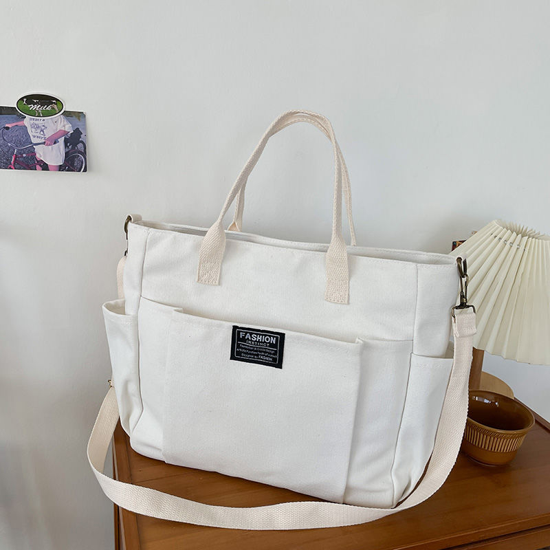 กระเป๋าผ้าแคนวาสใบใหญ่สำหรับผู - Canvas Tote Designer บทวิจารณ์และราคา
